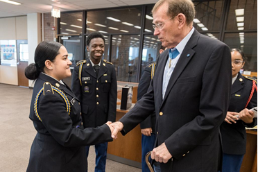 Medal of Honor Recipient Roger H.C. Donlon with a Junior ROTC member.