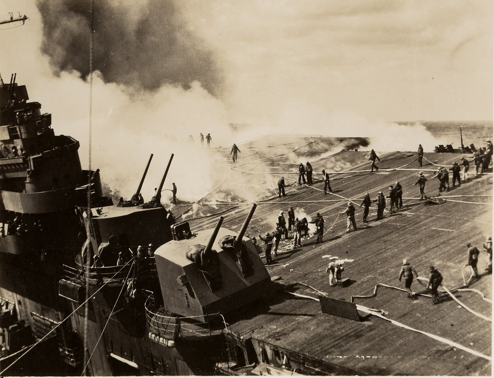 Sailors of the U.S.S. Franklin (CV-13) fight the fires ignited by a Japanese attack on March 19, 1945, Photo courtesy Patriots Point Naval & Maritime Museum, Mt. Pleasant, SC. 